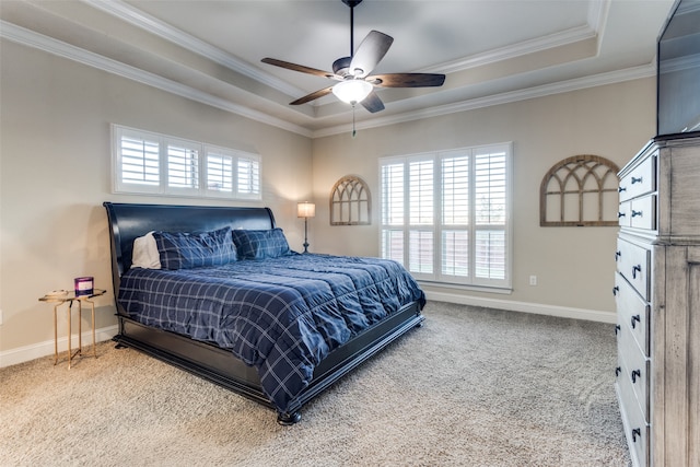 bedroom with multiple windows, ceiling fan, crown molding, and carpet floors