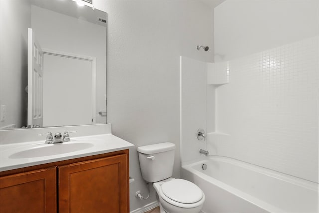 full bathroom with shower / bath combination, vanity, and toilet