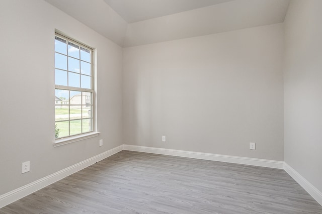 unfurnished room with light hardwood / wood-style floors