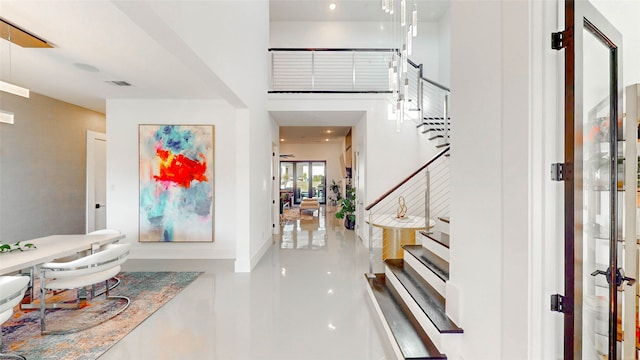 entrance foyer featuring concrete flooring