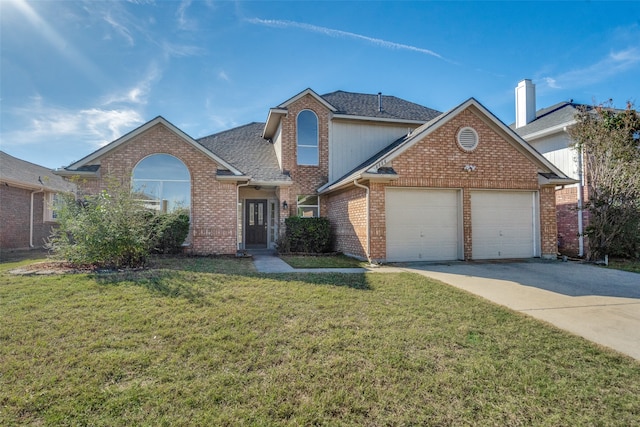 view of property featuring a garage and a front yard