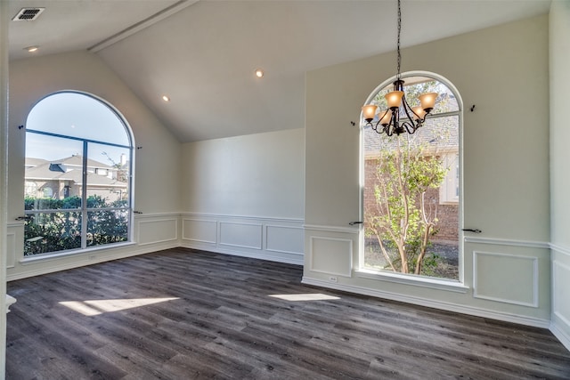 unfurnished dining area featuring dark wood-type flooring, an inviting chandelier, and vaulted ceiling