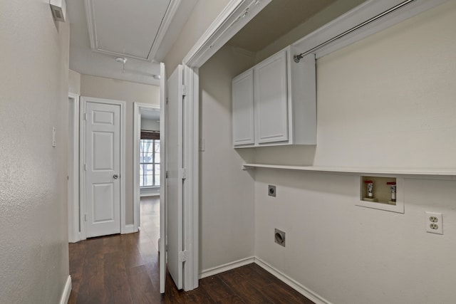 laundry room featuring electric dryer hookup, cabinets, dark wood-type flooring, and washer hookup