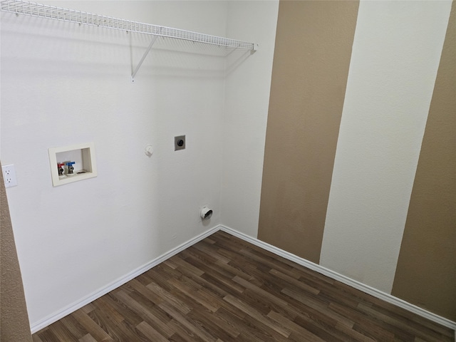 laundry room with hookup for an electric dryer, dark wood-type flooring, hookup for a washing machine, and hookup for a gas dryer