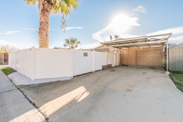 view of side of property featuring a carport