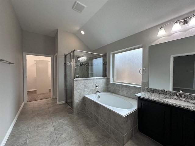 bathroom with tile patterned flooring, a textured ceiling, vanity, shower with separate bathtub, and vaulted ceiling