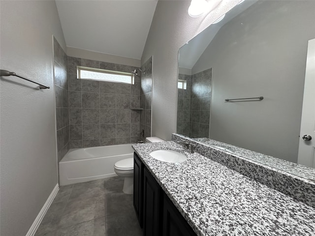 full bathroom with toilet, vaulted ceiling, tile patterned flooring, tiled shower / bath, and vanity