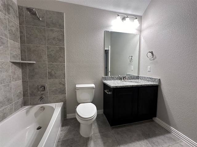 full bathroom featuring toilet, vanity, tiled shower / bath, and tile patterned flooring