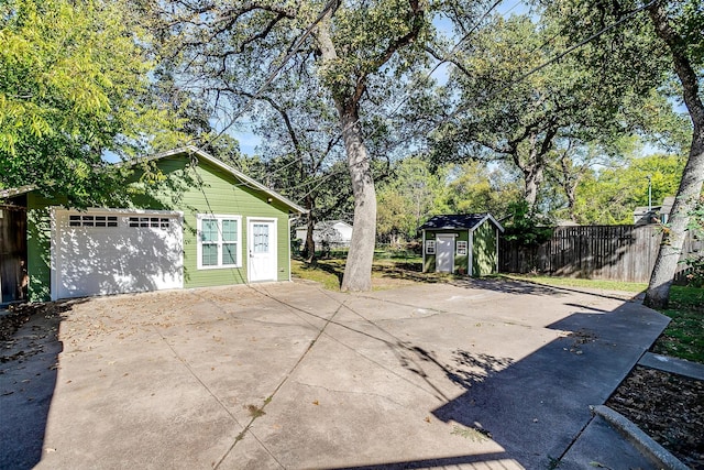 view of patio featuring a storage unit