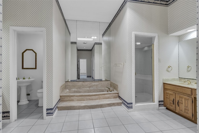 full bath featuring wallpapered walls, a stall shower, a sink, tile patterned flooring, and a bath