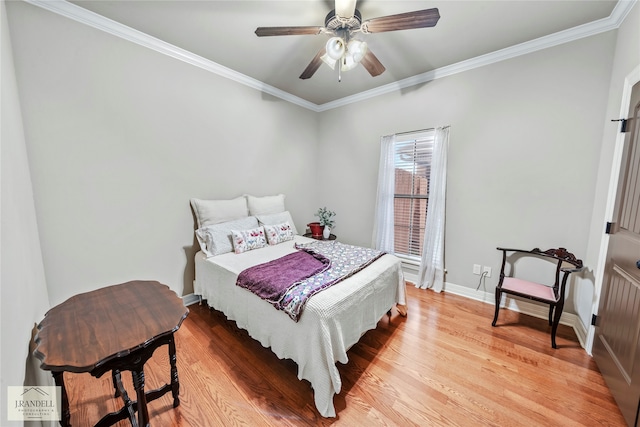 bedroom featuring wood-type flooring, ceiling fan, and crown molding