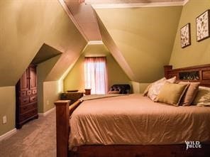 carpeted bedroom with vaulted ceiling