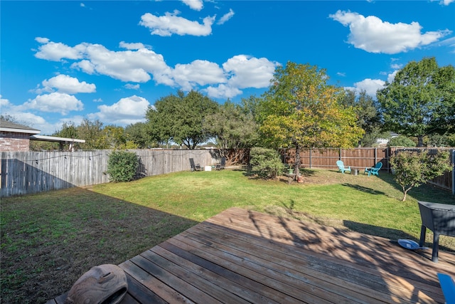 view of yard featuring a wooden deck