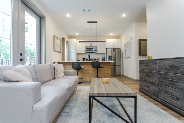 living room featuring light wood-type flooring