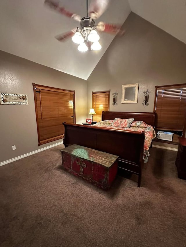 bedroom with high vaulted ceiling, dark colored carpet, ceiling fan, and baseboards