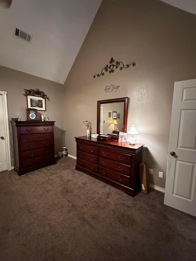 bedroom featuring high vaulted ceiling, dark colored carpet, visible vents, and baseboards