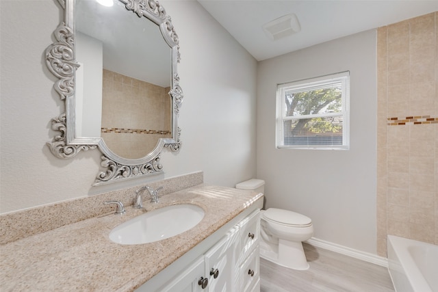 full bathroom featuring shower / bathing tub combination, wood-type flooring, toilet, and vanity