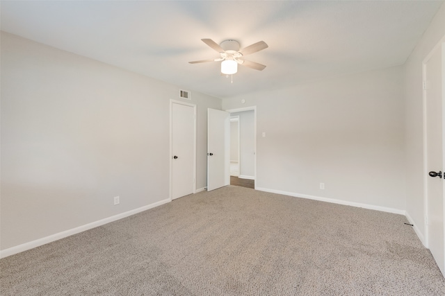 carpeted empty room with ceiling fan