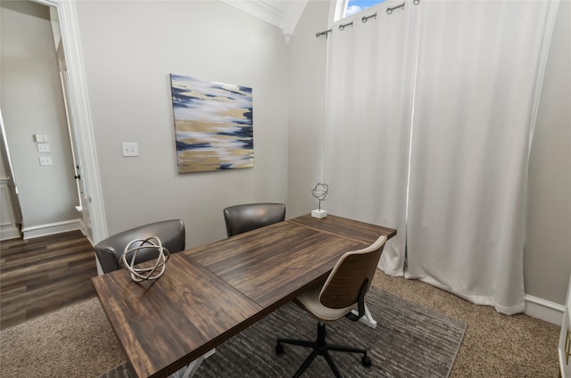 home office featuring ornamental molding and dark wood-type flooring