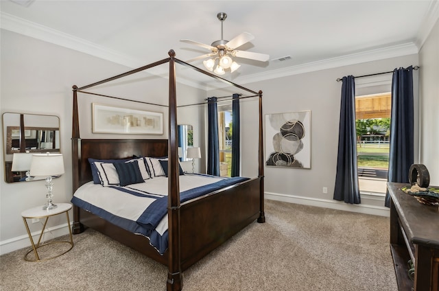 bedroom featuring ceiling fan, crown molding, and light colored carpet