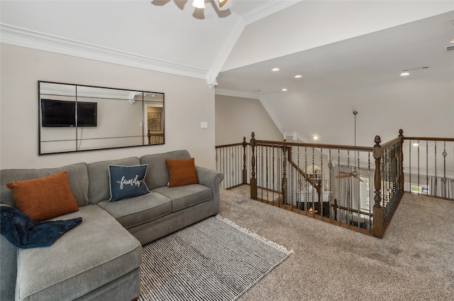 carpeted living room featuring ornamental molding, ceiling fan, and vaulted ceiling