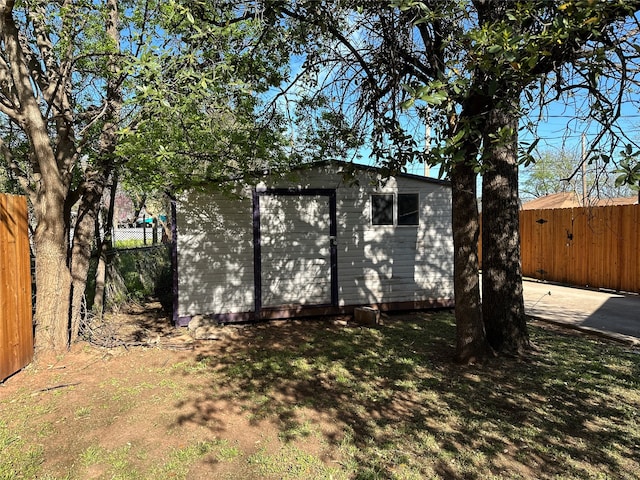 exterior space with a storage shed