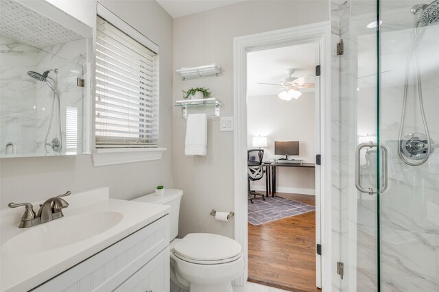 bedroom featuring hardwood / wood-style floors, ceiling fan, and ornamental molding