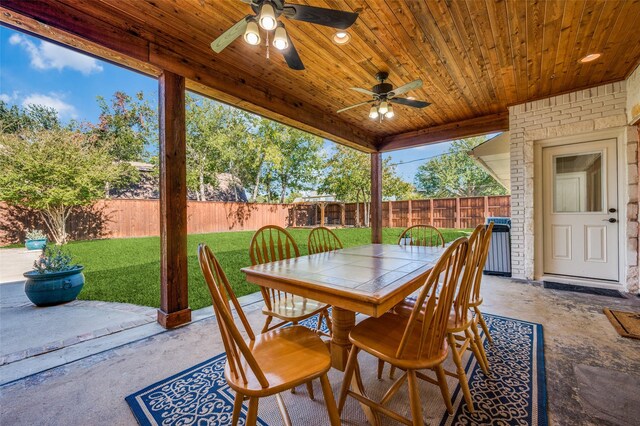 view of patio / terrace featuring ceiling fan and french doors