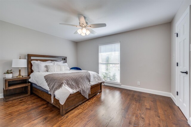 bedroom with light hardwood / wood-style flooring, ceiling fan, and ornamental molding