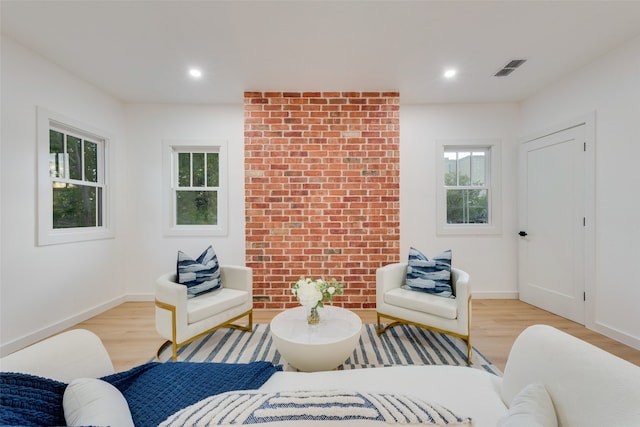 living area with light hardwood / wood-style floors