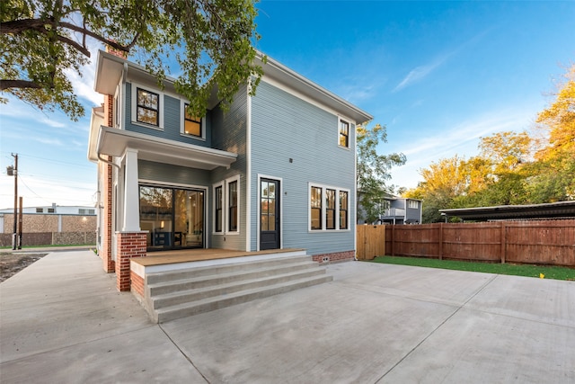 back of house featuring a patio area