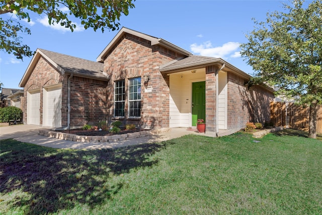 view of front facade featuring a front lawn and a garage