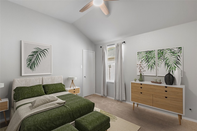 carpeted bedroom featuring ceiling fan and lofted ceiling