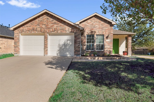 single story home with a garage and a front lawn