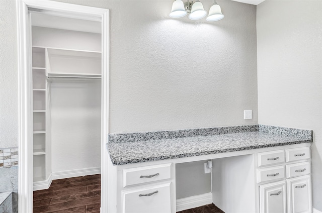 bathroom with hardwood / wood-style floors and vanity