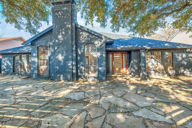 back of house featuring a patio area