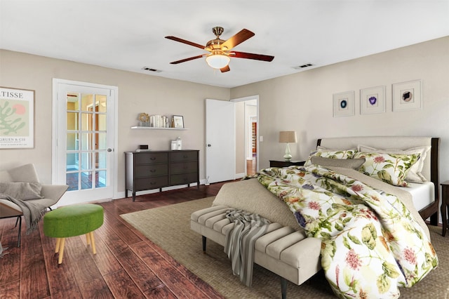 bedroom with ceiling fan and dark hardwood / wood-style flooring