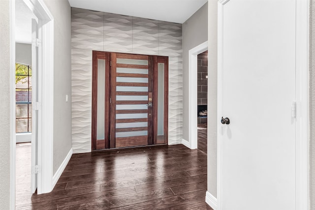 foyer entrance featuring dark hardwood / wood-style floors