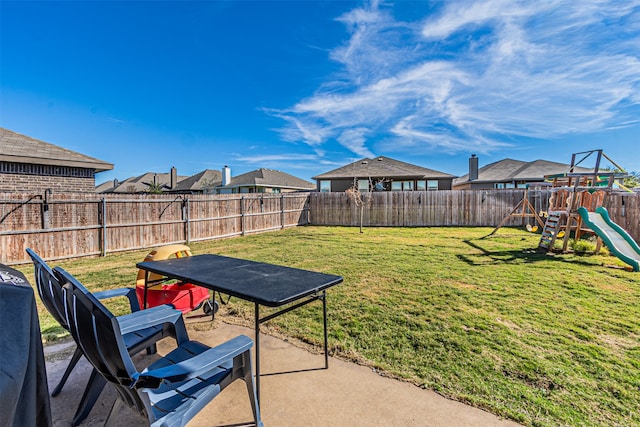 view of yard with a playground