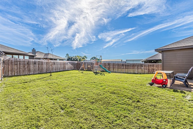 view of yard with a playground