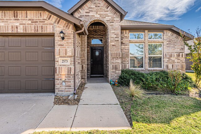 property entrance with a garage