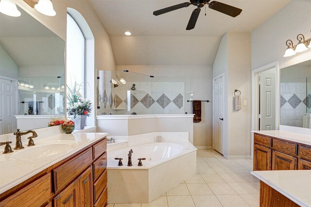 bathroom featuring vanity, separate shower and tub, ceiling fan, tile patterned flooring, and lofted ceiling