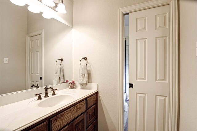 full bathroom featuring vanity, toilet, and enclosed tub / shower combo