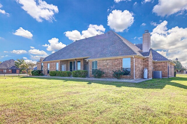 view of outdoor structure with a lawn