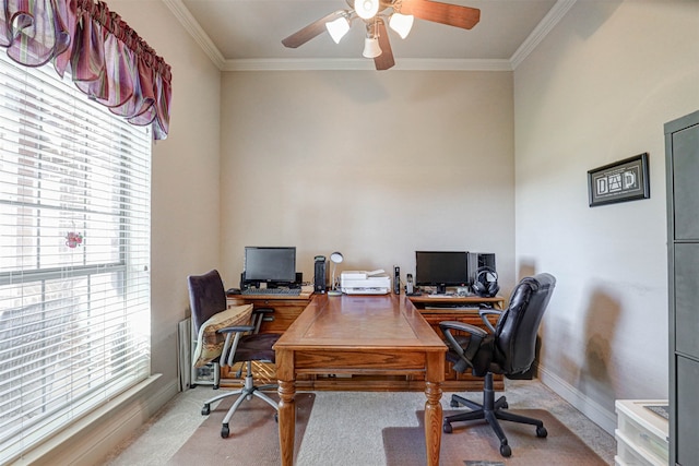 office area with ceiling fan, light colored carpet, and crown molding