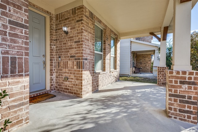 entrance to property with a porch