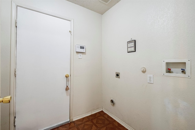 washroom with washer hookup, hookup for an electric dryer, hookup for a gas dryer, and dark parquet floors