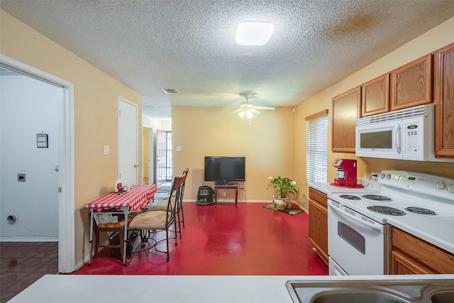 721 Grambling Dr, Dallas, TX 75241 - kitchen with white appliances, a textured ceiling, a ceiling fan, brown cabinetry, and light countertops