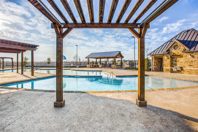 view of pool featuring a gazebo and a patio