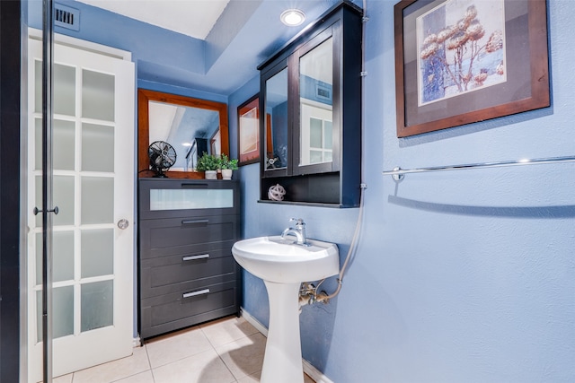 bathroom featuring tile patterned flooring